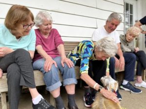 residents with dog from Adopt-A-Pet