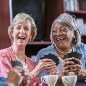 laughing while playing cards