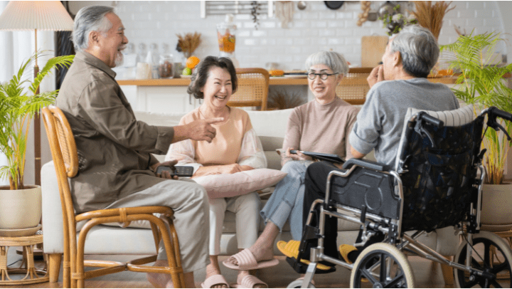 a group of seniors smiling each other 