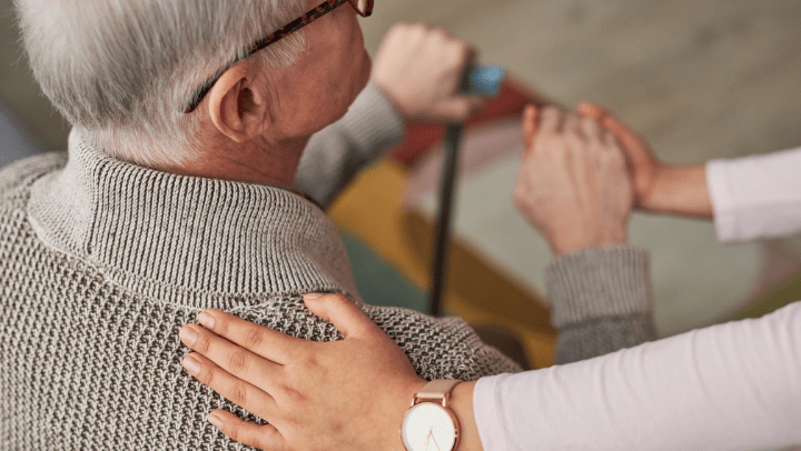 caregiver taking care of a senior
